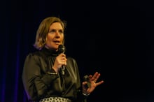 Presenter speaking to delegates