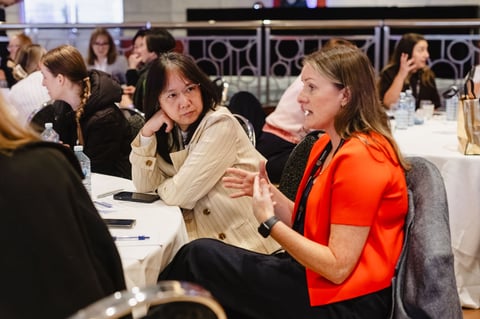 Two delegates in conversation at the Women in Leadership Summit Melbourne 2026